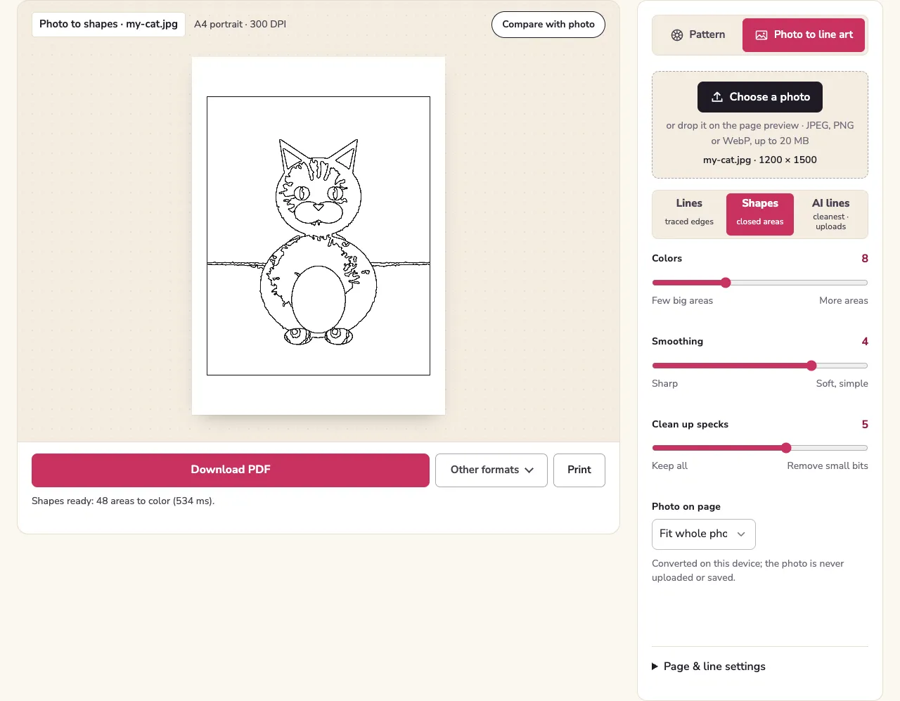 The huepad photo tool with a drawn cat converted to Shapes: the page preview on the left, and on the right the style picker set to Shapes with Colors 8, Smoothing 4 and Clean up specks 5